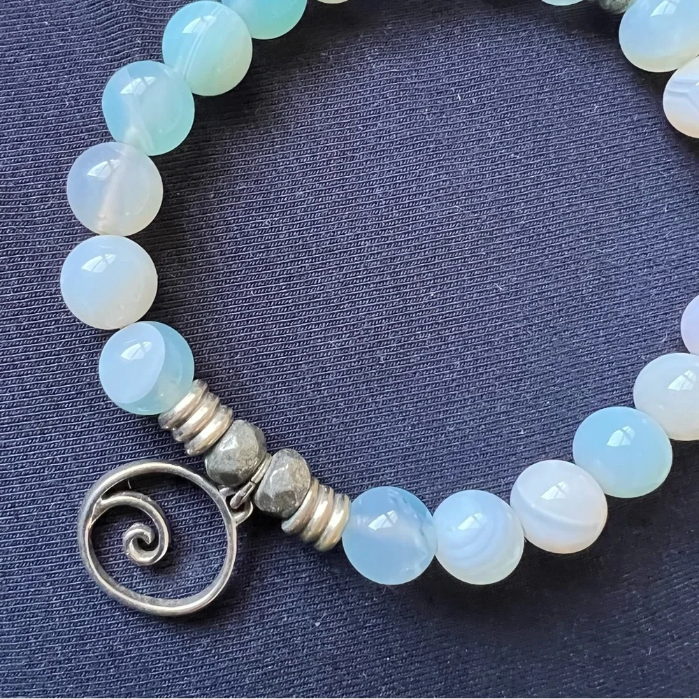 T Jazelle blue aquamarine bracelet with wave charm